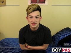 Twink tugs on his big fat boner and shoves a toy inside him