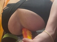 Unusual horse-sized dildo penetrates anus deeply