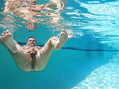 Hairy man frolics and cums underwater!