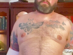 TattedRockerbear strips and cums