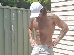 Hairy inked showing off outdoors