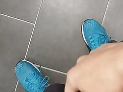 In the locker room of the gym.