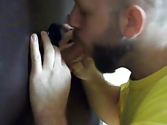 Hot sucking action at the homemade glory hole 5