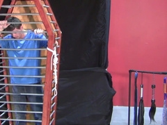 Caged boy is eager to experience his first maledom experience