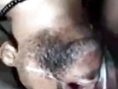 A Indian guy drinks cum