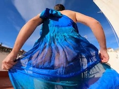 Sissy goddess in a see-through dress shows off her sexy cock and ass while having fun outdoors
