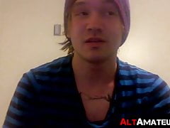 Tattooed punk dude jerking off his big throbbing cock solo