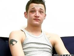 Inked young guy jerks off on interview