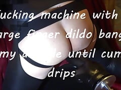 Fucking machine with a large finger dildo bangs my asshole until cum drips