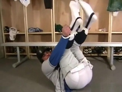 Baseball Player Tied Up With His Baseball Stirrups On