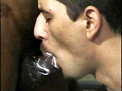 Young Hispanic male gives black dick covered in whip cream a blowjob