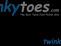Troy Vara kneels down and services Andy Fishers big feet and mighty dick