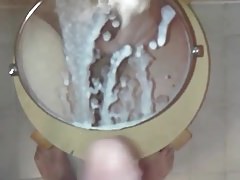 Big cumshot onto a mirror