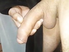 Playing with my cok watching precum flow out of my cock