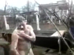 older man outdoor bathing