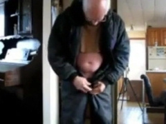 Silver Fox Strokes Wood at the Sawmill