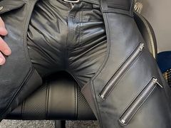 Leather daddy bulging in leather jeans and leather chaps