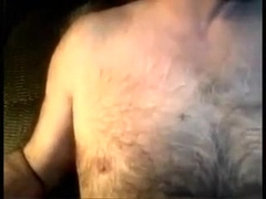 Silver furry man watching porn and cums on his belly