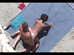 Fledgling couples filmed nailing on the beach