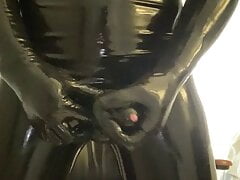 Fully enclosed in latex masturbation and cumshot