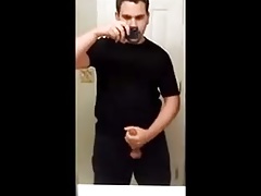 Twink films himself squirting on bathroom mirror