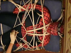 Restrained spiderman gets an enjoying
