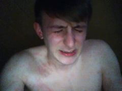 Slapping his balls using a shoes
