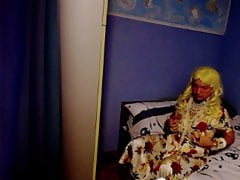 Crossdresser in a dress dancing and cumming in bed