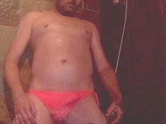 Crossdressed stud Madaussiehere turns up the heat in a pink bikini while getting off in the shower