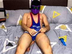 Adorable twink in an athletic gimp outfit having some solo fun