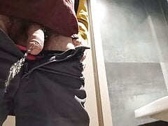 Pissing in a public toilet, uncutted cock.