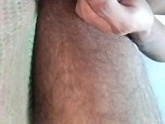 Rubbing dick with oil