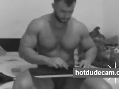 Sexy hunk alone in his bedroom