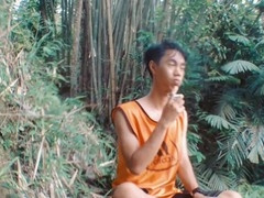 Slender gay Asian enjoys bareback sex with mature man outdoors