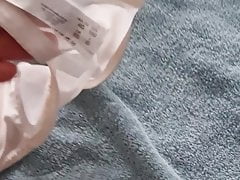 Jerking off on my wifes big cups bra
