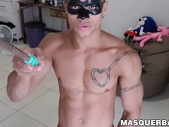 Strong man in a mask records himself jerking off