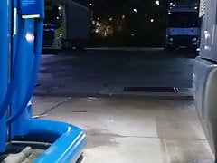 At the filling station with shorts and ripped ass