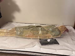 Apr 2 2023 - VacPacked in my latex sleepsack wearing my hockey shorts with my PVC aprons lead aprons and hockey chestie