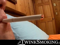 Cocky smoker Bryce Corbin smokes cig while gently stroking his cock