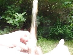 Me laying nude in park and start pissing