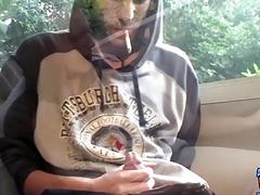 Gay twink smoking alone and tugging on his massive schlong