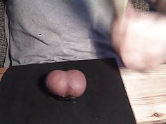 Exercises with a tennis racket on a black table