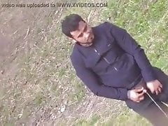 Hot fella taking a piss