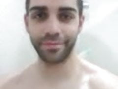 Spaniard man taking a shower