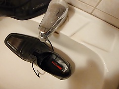 Piss in men's dress shoe