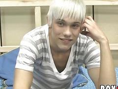 Young gay man playing with his dick during an interview