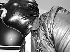 Slave deepthroat in leather and latex