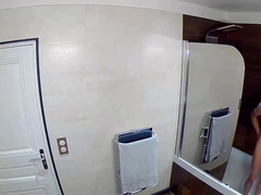 Shower of a skinny teen boy peeing washing his cock and his nipples