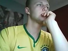 Young footballer plays with his uncut cock