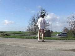 crossdresser on a road parking lot sounding in garter belt 5